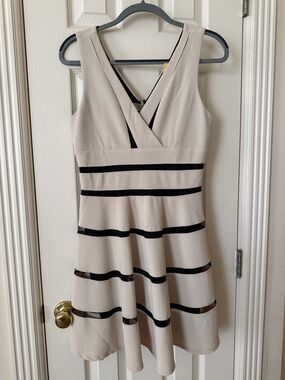 Sleeveless Cream Fit-and-Flare Dress with Black Stripes